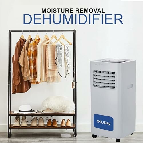 Dehumidifier next to a clothes rack with various garments.