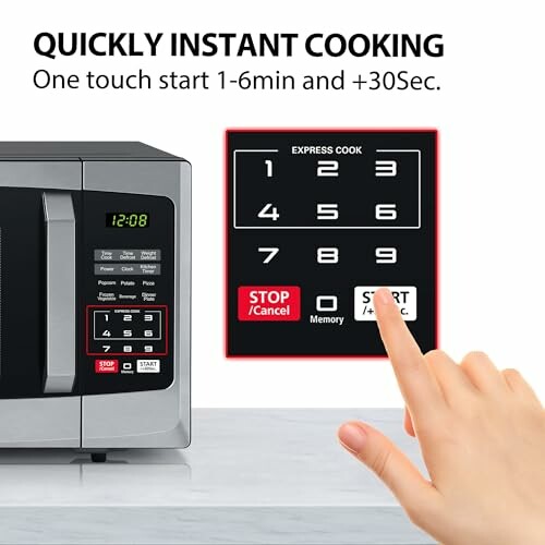 Hand pressing button on microwave for instant cooking.