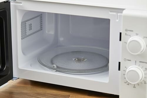 Open microwave oven with turntable